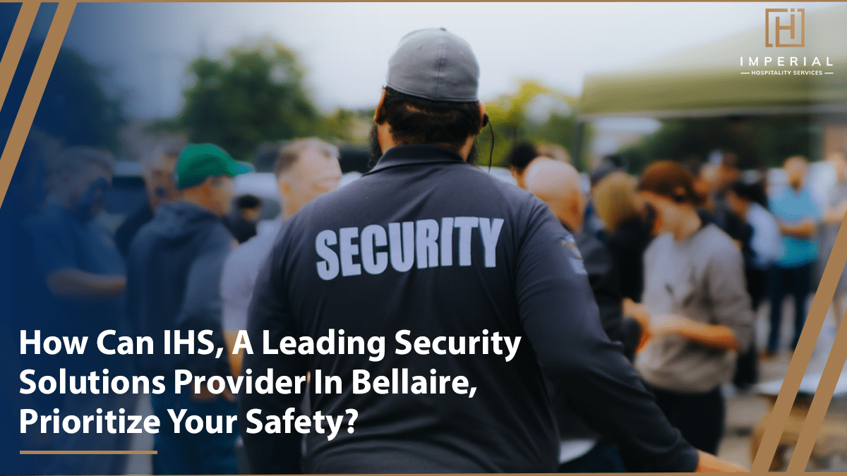 A security officer stands facing a crowd outdoors, wearing a jacket labeled "Security." The text reads, "How Can IHS, offering security guards services in Bellaire, prioritize your safety?.